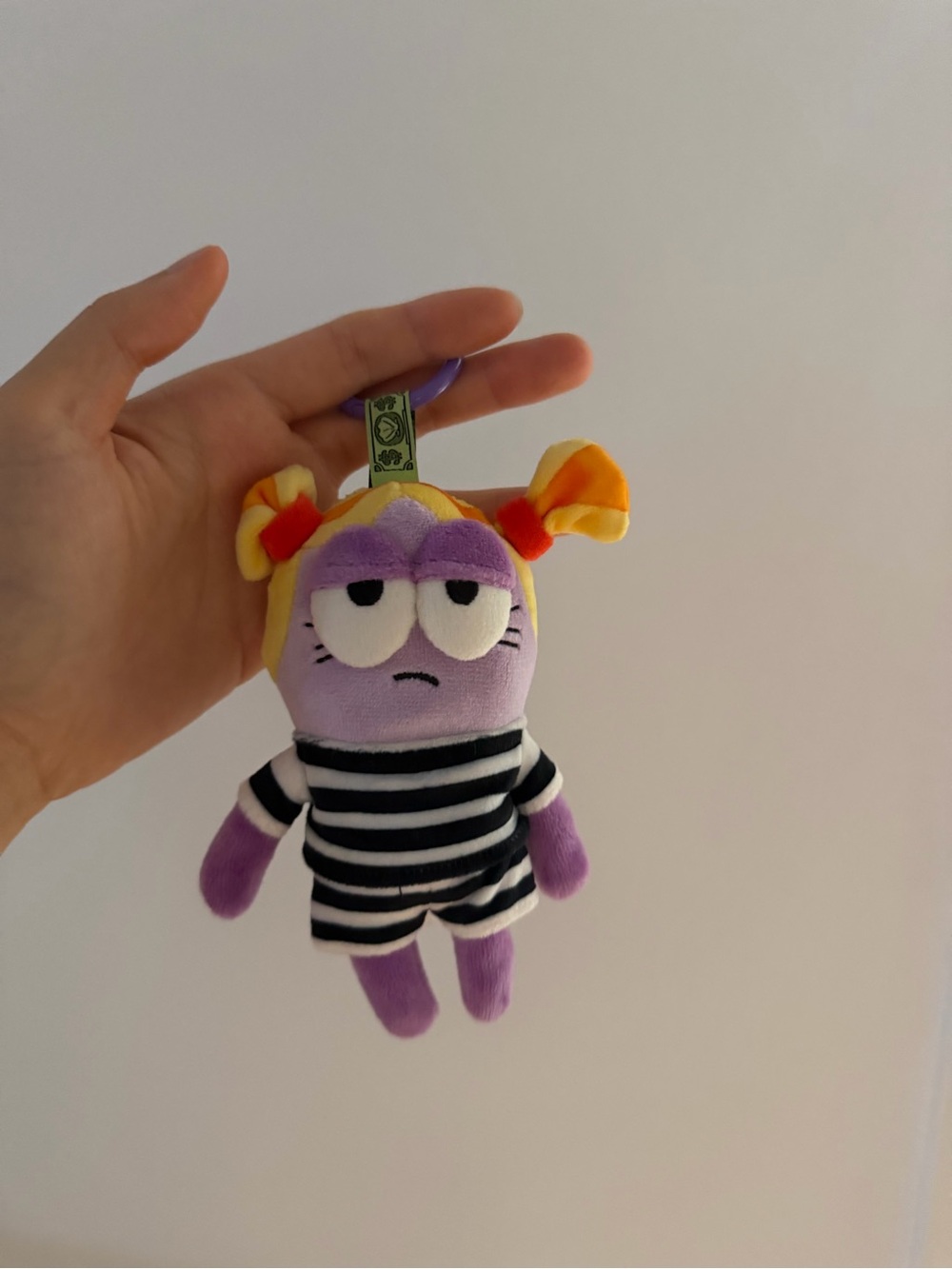 Purple Plush Character Keychain with Yellow & Orange Hair and Striped Outfit